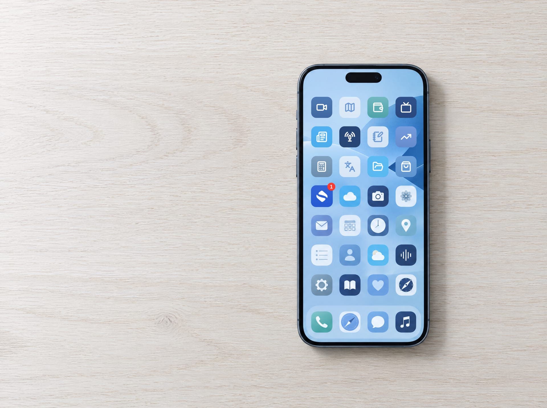 A phone lying face up on a desk as a SentraMed notification arrives